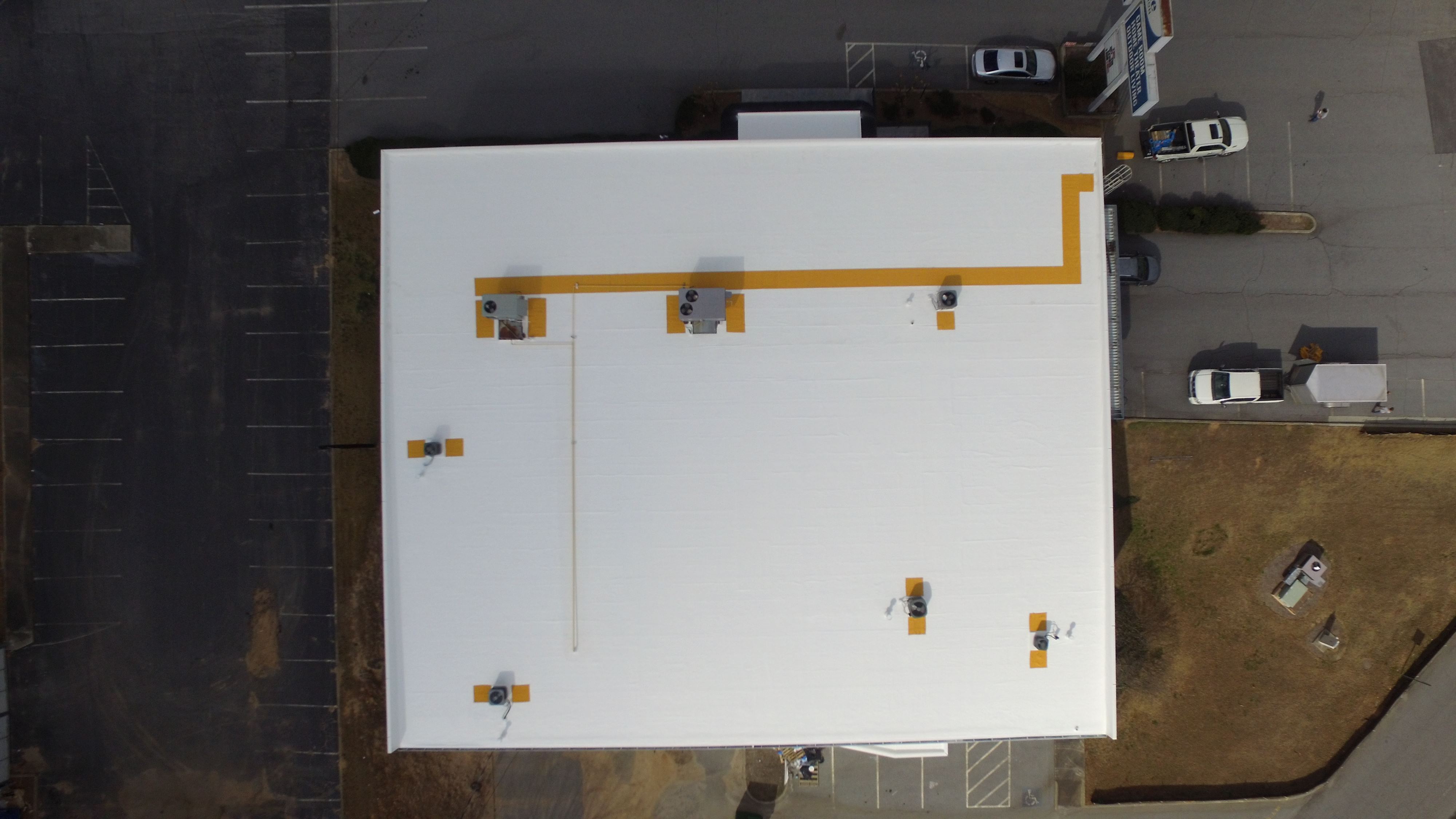 Fabric reinforced roof design